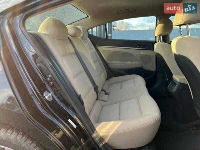 Чорний Хендай Елантра, об'ємом двигуна 2 л та пробігом 98 тис. км за 13990 $, фото 9 на Automoto.ua