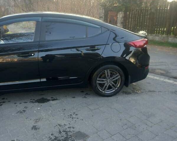 Чорний Хендай Елантра, об'ємом двигуна 1.6 л та пробігом 245 тис. км за 12700 $, фото 4 на Automoto.ua