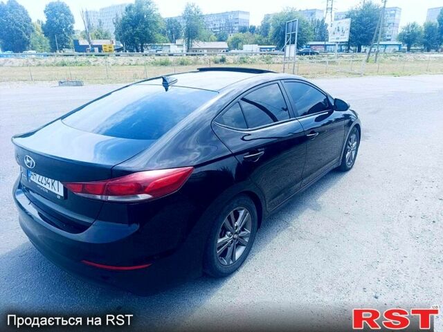 Чорний Хендай Елантра, об'ємом двигуна 2 л та пробігом 96 тис. км за 12000 $, фото 3 на Automoto.ua