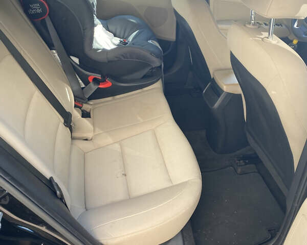 Черный Хендай Элантра, объемом двигателя 2 л и пробегом 56 тыс. км за 14000 $, фото 17 на Automoto.ua