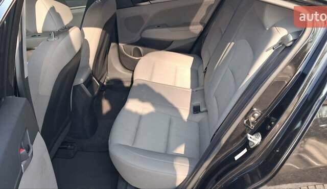 Черный Хендай Элантра, объемом двигателя 2 л и пробегом 75 тыс. км за 12500 $, фото 7 на Automoto.ua