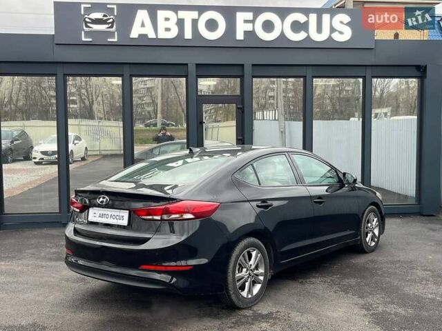 Чорний Хендай Елантра, об'ємом двигуна 2 л та пробігом 98 тис. км за 13990 $, фото 6 на Automoto.ua