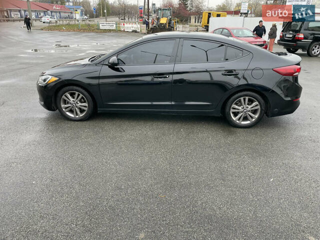 Чорний Хендай Елантра, об'ємом двигуна 2 л та пробігом 159 тис. км за 9600 $, фото 1 на Automoto.ua