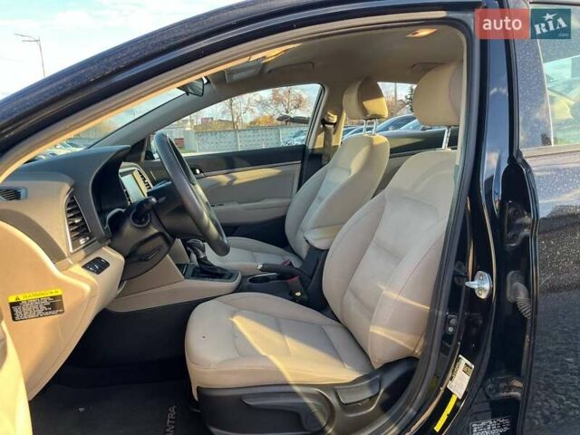 Чорний Хендай Елантра, об'ємом двигуна 2 л та пробігом 98 тис. км за 13990 $, фото 7 на Automoto.ua