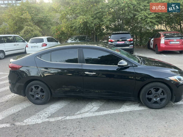 Черный Хендай Элантра, объемом двигателя 1.59 л и пробегом 210 тыс. км за 9300 $, фото 1 на Automoto.ua