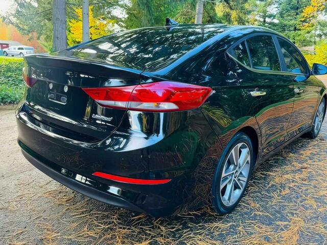 Чорний Хендай Елантра, об'ємом двигуна 2 л та пробігом 54 тис. км за 8100 $, фото 4 на Automoto.ua