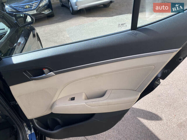 Черный Хендай Элантра, объемом двигателя 2 л и пробегом 56 тыс. км за 14000 $, фото 18 на Automoto.ua