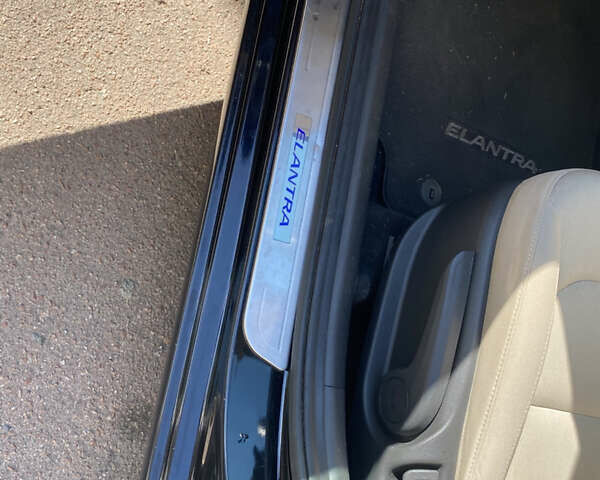 Черный Хендай Элантра, объемом двигателя 2 л и пробегом 56 тыс. км за 14000 $, фото 21 на Automoto.ua