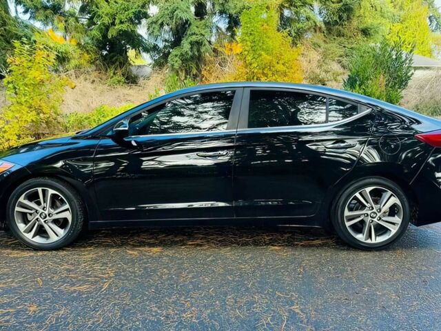 Чорний Хендай Елантра, об'ємом двигуна 2 л та пробігом 54 тис. км за 8100 $, фото 3 на Automoto.ua