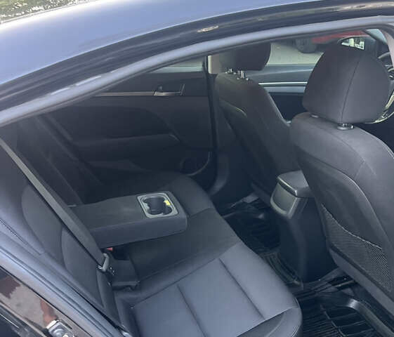 Черный Хендай Элантра, объемом двигателя 1.59 л и пробегом 210 тыс. км за 9300 $, фото 5 на Automoto.ua