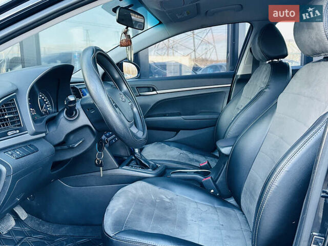 Чорний Хендай Елантра, об'ємом двигуна 1.6 л та пробігом 150 тис. км за 10700 $, фото 12 на Automoto.ua