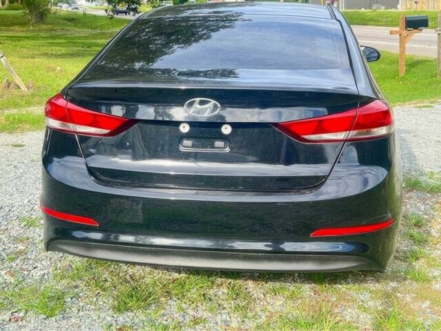 Черный Хендай Элантра, объемом двигателя 2 л и пробегом 43 тыс. км за 7200 $, фото 5 на Automoto.ua