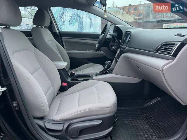 Черный Хендай Элантра, объемом двигателя 2 л и пробегом 138 тыс. км за 11990 $, фото 9 на Automoto.ua