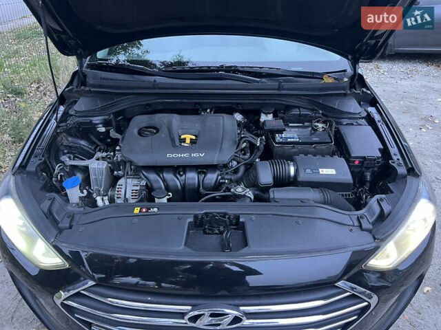 Черный Хендай Элантра, объемом двигателя 2 л и пробегом 125 тыс. км за 9300 $, фото 17 на Automoto.ua