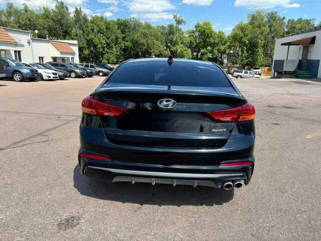 Черный Хендай Элантра, объемом двигателя 1.6 л и пробегом 32 тыс. км за 14000 $, фото 5 на Automoto.ua