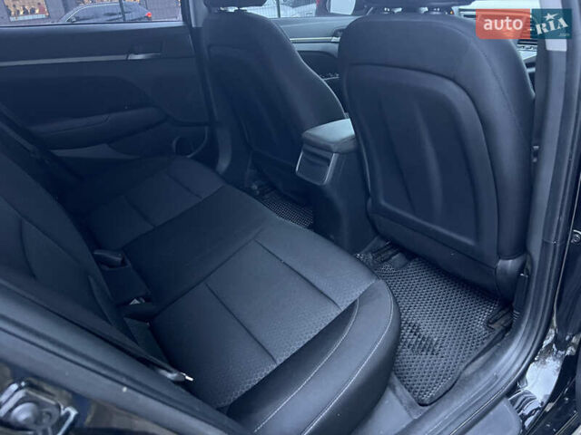 Черный Хендай Элантра, объемом двигателя 2 л и пробегом 125 тыс. км за 9300 $, фото 16 на Automoto.ua