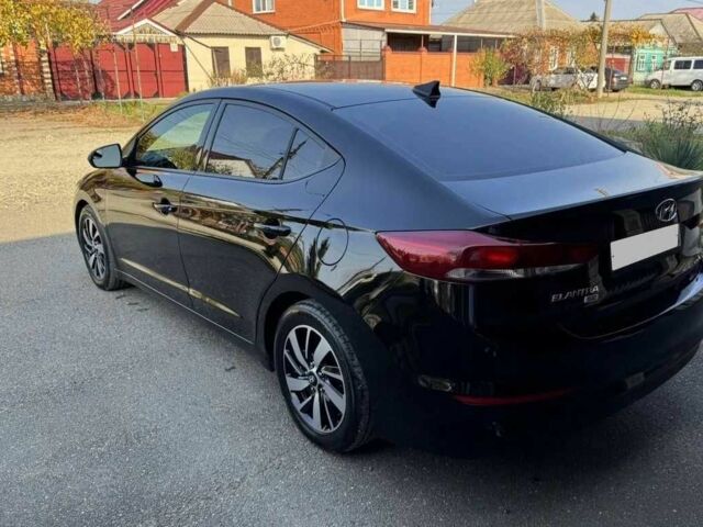 Чорний Хендай Елантра, об'ємом двигуна 2 л та пробігом 103 тис. км за 9200 $, фото 5 на Automoto.ua