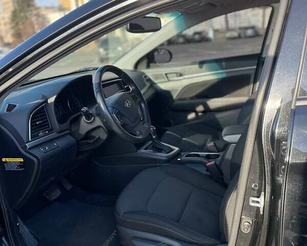 Черный Хендай Элантра, объемом двигателя 2 л и пробегом 85 тыс. км за 13600 $, фото 4 на Automoto.ua