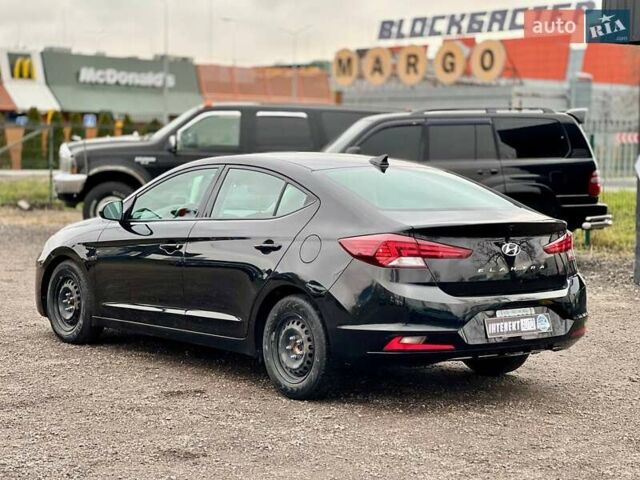 Чорний Хендай Елантра, об'ємом двигуна 2 л та пробігом 166 тис. км за 14300 $, фото 2 на Automoto.ua