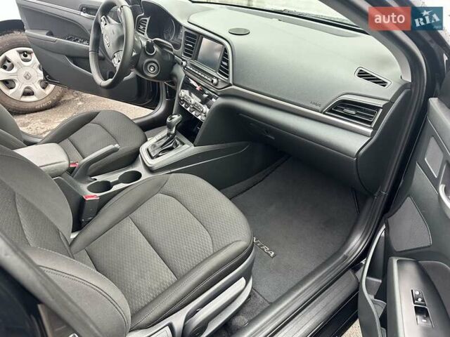 Черный Хендай Элантра, объемом двигателя 2 л и пробегом 75 тыс. км за 14200 $, фото 11 на Automoto.ua