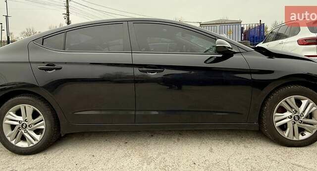 Черный Хендай Элантра, объемом двигателя 2 л и пробегом 90 тыс. км за 9000 $, фото 11 на Automoto.ua
