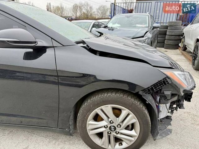 Черный Хендай Элантра, объемом двигателя 2 л и пробегом 90 тыс. км за 8500 $, фото 14 на Automoto.ua