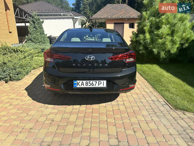 Черный Хендай Элантра, объемом двигателя 2 л и пробегом 48 тыс. км за 14800 $, фото 4 на Automoto.ua