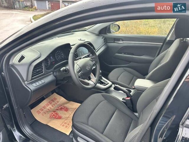 Черный Хендай Элантра, объемом двигателя 2 л и пробегом 75 тыс. км за 14200 $, фото 8 на Automoto.ua