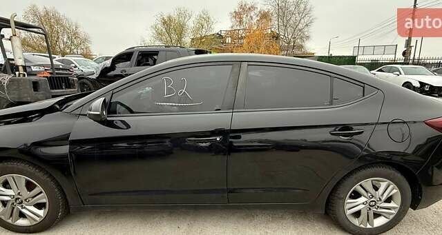 Черный Хендай Элантра, объемом двигателя 2 л и пробегом 90 тыс. км за 8500 $, фото 5 на Automoto.ua