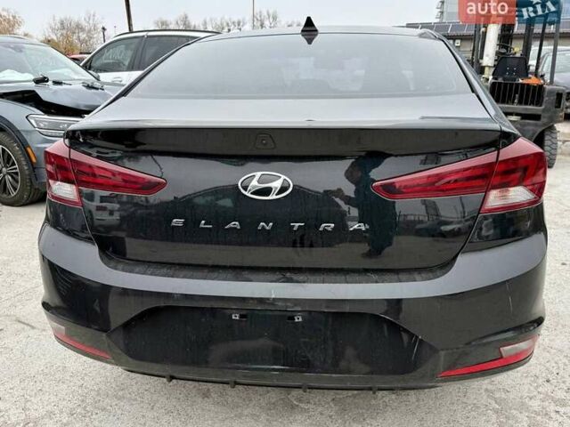 Черный Хендай Элантра, объемом двигателя 2 л и пробегом 90 тыс. км за 9000 $, фото 10 на Automoto.ua