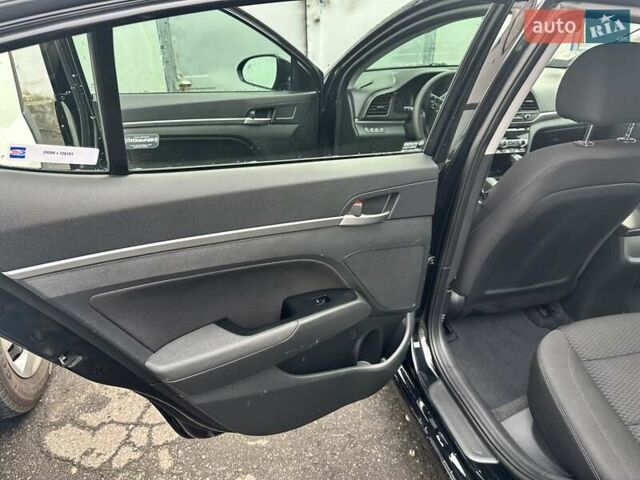 Черный Хендай Элантра, объемом двигателя 2 л и пробегом 75 тыс. км за 14200 $, фото 13 на Automoto.ua