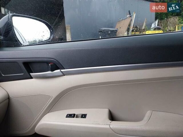 Черный Хендай Элантра, объемом двигателя 2 л и пробегом 95 тыс. км за 15250 $, фото 28 на Automoto.ua