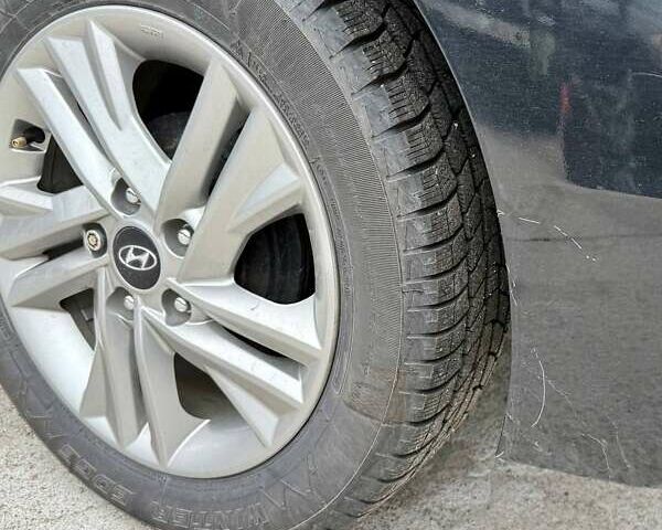 Черный Хендай Элантра, объемом двигателя 2 л и пробегом 90 тыс. км за 8500 $, фото 9 на Automoto.ua