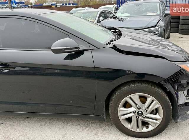 Черный Хендай Элантра, объемом двигателя 2 л и пробегом 90 тыс. км за 8500 $, фото 13 на Automoto.ua