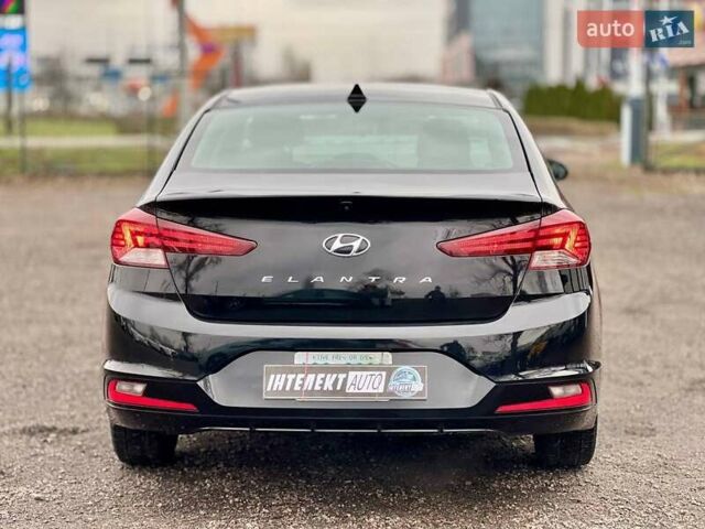 Чорний Хендай Елантра, об'ємом двигуна 2 л та пробігом 166 тис. км за 14300 $, фото 3 на Automoto.ua