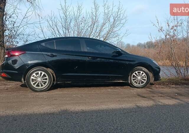 Черный Хендай Элантра, объемом двигателя 1.59 л и пробегом 98 тыс. км за 13800 $, фото 6 на Automoto.ua