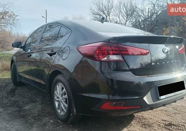 Черный Хендай Элантра, объемом двигателя 1.59 л и пробегом 98 тыс. км за 13800 $, фото 8 на Automoto.ua
