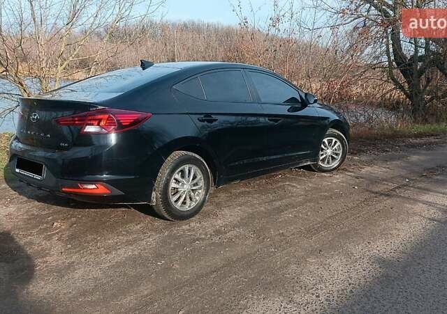 Черный Хендай Элантра, объемом двигателя 1.59 л и пробегом 98 тыс. км за 13800 $, фото 7 на Automoto.ua