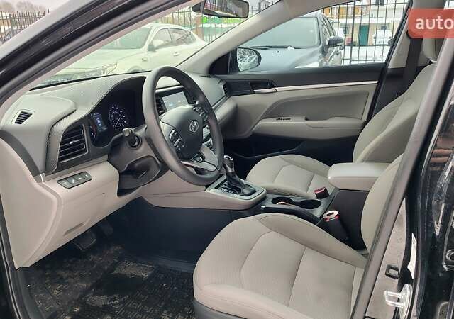 Чорний Хендай Елантра, об'ємом двигуна 2 л та пробігом 114 тис. км за 13999 $, фото 11 на Automoto.ua