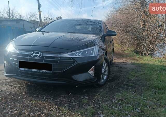 Черный Хендай Элантра, объемом двигателя 1.59 л и пробегом 98 тыс. км за 13800 $, фото 4 на Automoto.ua