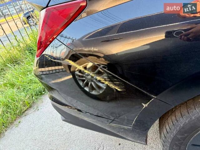 Черный Хендай Элантра, объемом двигателя 2 л и пробегом 85 тыс. км за 11000 $, фото 13 на Automoto.ua