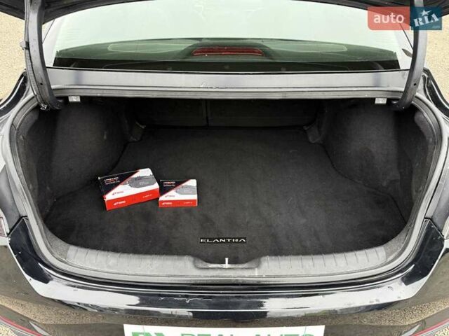 Черный Хендай Элантра, объемом двигателя 2 л и пробегом 92 тыс. км за 12998 $, фото 11 на Automoto.ua