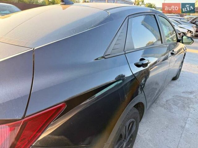 Черный Хендай Элантра, объемом двигателя 2 л и пробегом 85 тыс. км за 11000 $, фото 10 на Automoto.ua