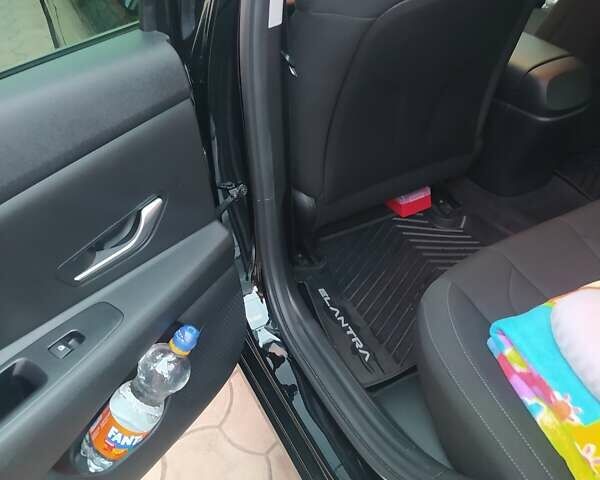 Черный Хендай Элантра, объемом двигателя 1.58 л и пробегом 83 тыс. км за 18999 $, фото 10 на Automoto.ua