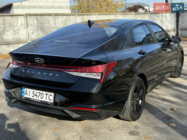 Чорний Хендай Елантра, об'ємом двигуна 2 л та пробігом 159 тис. км за 16700 $, фото 7 на Automoto.ua