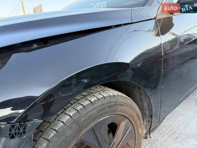 Черный Хендай Элантра, объемом двигателя 2 л и пробегом 85 тыс. км за 11000 $, фото 16 на Automoto.ua