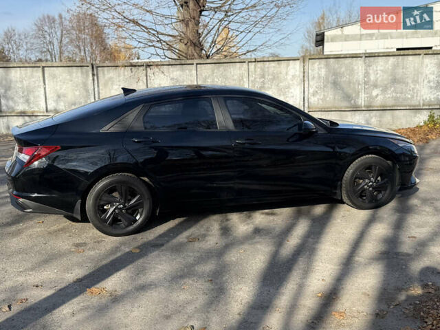 Чорний Хендай Елантра, об'ємом двигуна 2 л та пробігом 159 тис. км за 16700 $, фото 9 на Automoto.ua