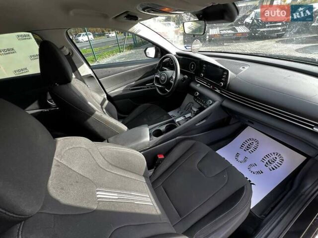 Чорний Хендай Елантра, об'ємом двигуна 2 л та пробігом 126 тис. км за 12700 $, фото 10 на Automoto.ua