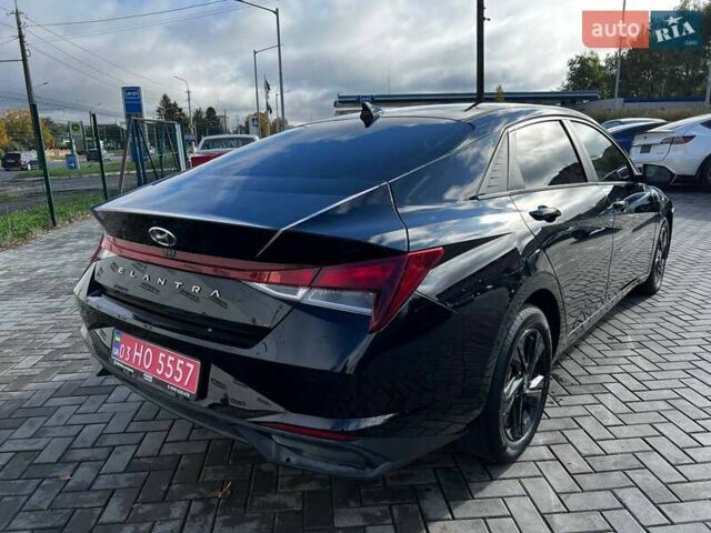 Чорний Хендай Елантра, об'ємом двигуна 2 л та пробігом 126 тис. км за 12700 $, фото 3 на Automoto.ua