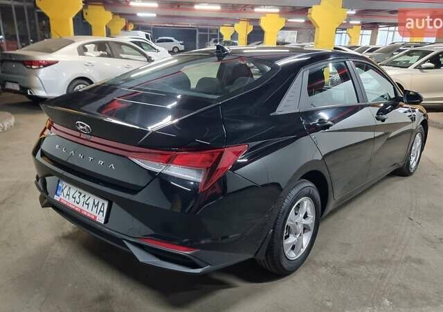 Черный Хендай Элантра, объемом двигателя 1.59 л и пробегом 55 тыс. км за 17900 $, фото 4 на Automoto.ua